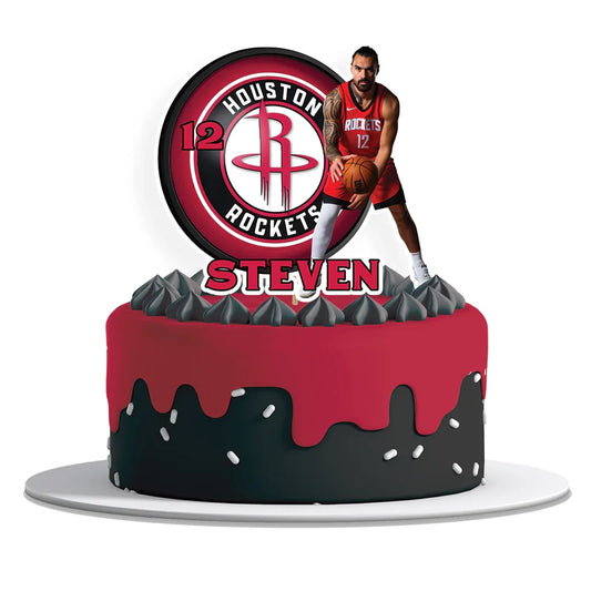 Steven Adams personalized cake toppers in purple and gold with team number printed on cardstock, displayed on cupcakes