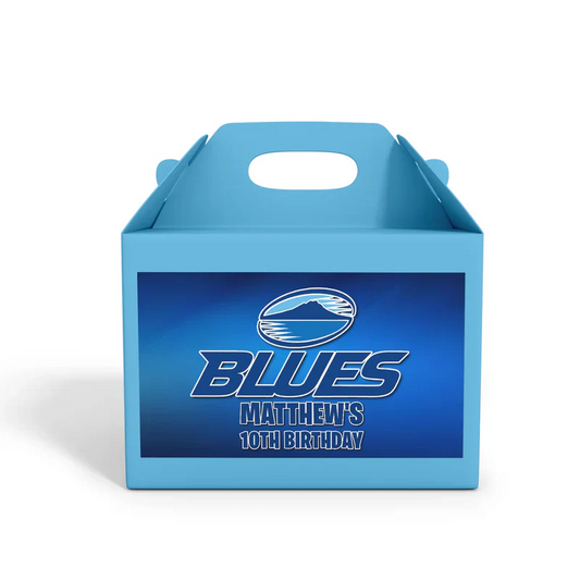 The Blues Rugby treat box label wrapped around a small paper favor box with vibrant navy blue stripes and logo accents.
