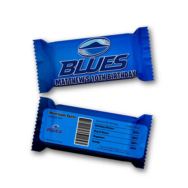 The Blues Rugby Rice Krispies treats label and candy bar label displaying matching blue and white wrappers in a flat lay.