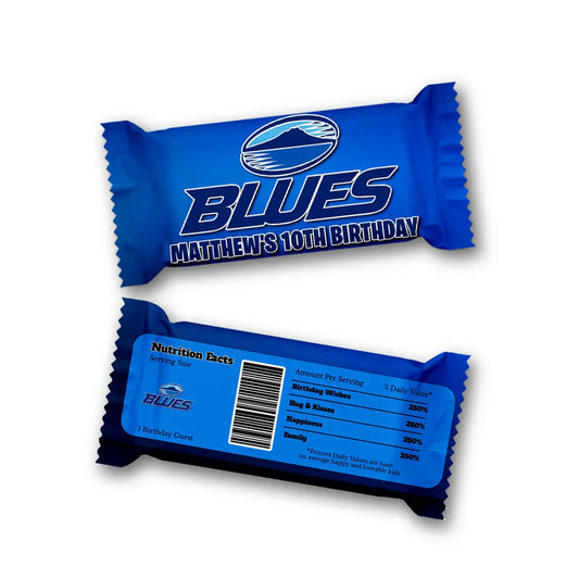 The Blues Rugby Rice Krispies treats label and candy bar label displaying matching blue and white wrappers in a flat lay.