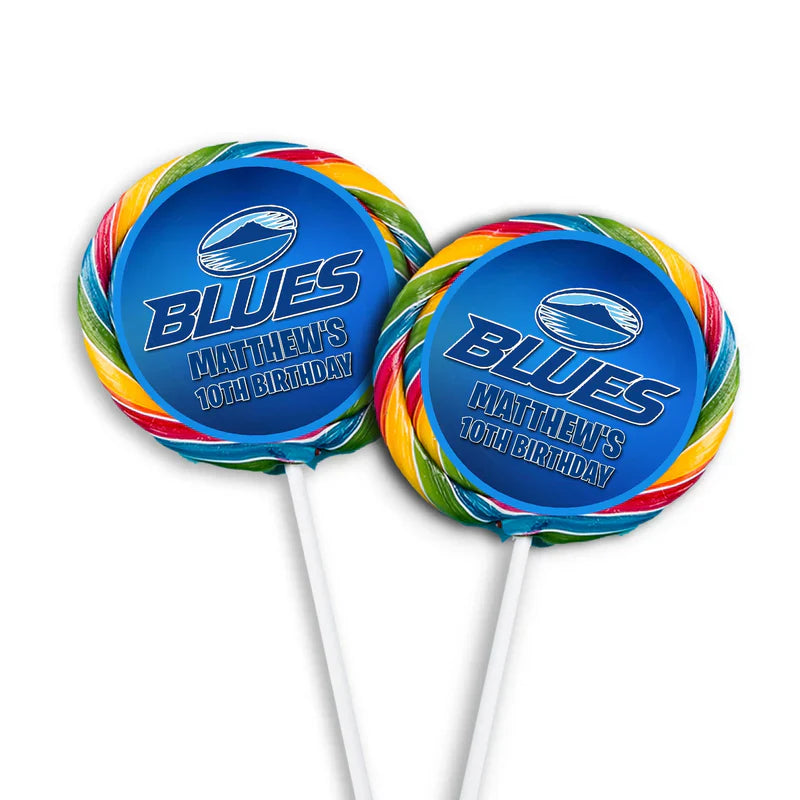 The Blues Rugby lollipop label featuring a round glossy sticker with a rugby ball graphic centered on a circular sucker.