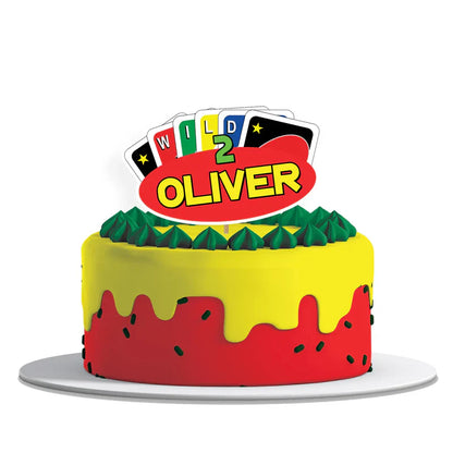 Uno cake toppers with bold number and color design, printed cutouts on card stock, flat lay view