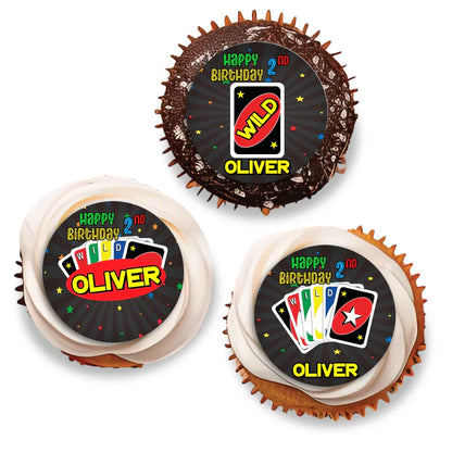Uno cupcake toppers with red, yellow, and black accents, round printed designs displayed in flat lay format